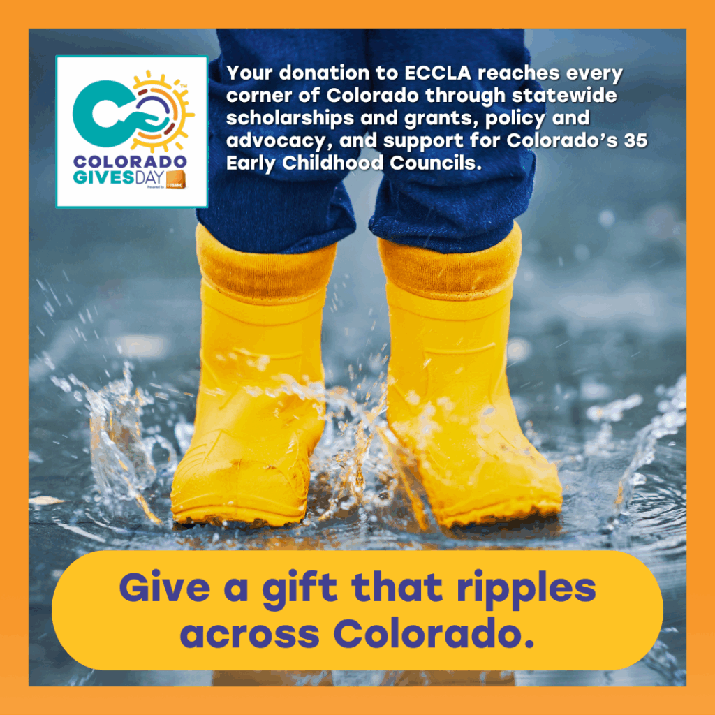 A child in yellow boots splashes a puddle, making ripples